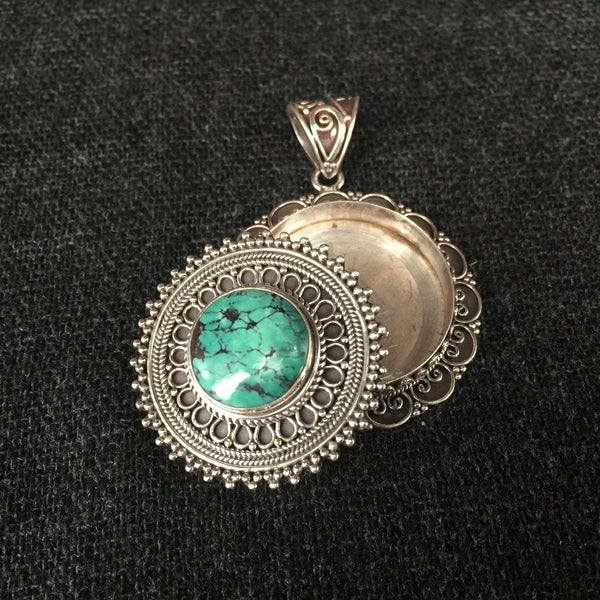 Detailed Handmade Himalayan Turquoise and Silver Pendant Jewelry at Mahakala Fine Arts