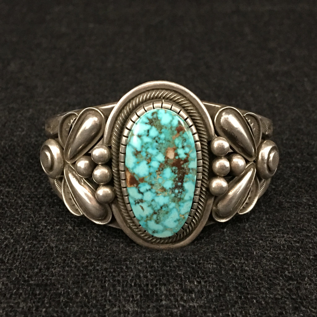 Native American Indian Navajo handmade sterling silver turquoise cuff bracelet by Rick Martinez at Mahakala Fine Arts