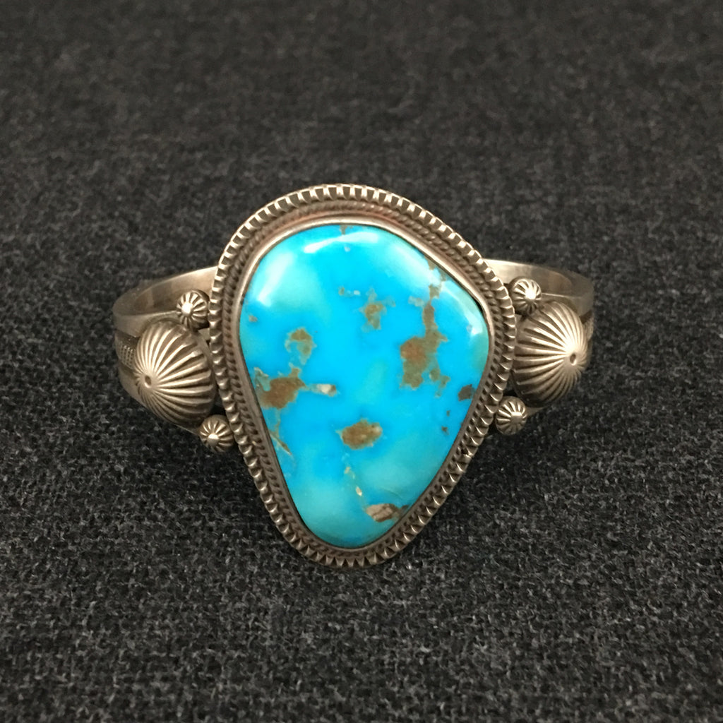 Native American Indian Navajo handmade sterling silver turquoise cuff bracelet by Calvin Martinez at Mahakala Fine Arts