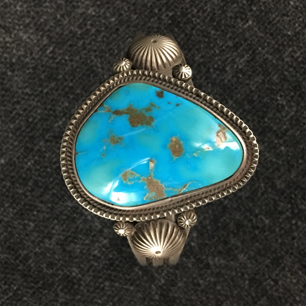 Native American Indian Navajo handmade sterling silver turquoise cuff bracelet by Calvin Martinez at Mahakala Fine Arts