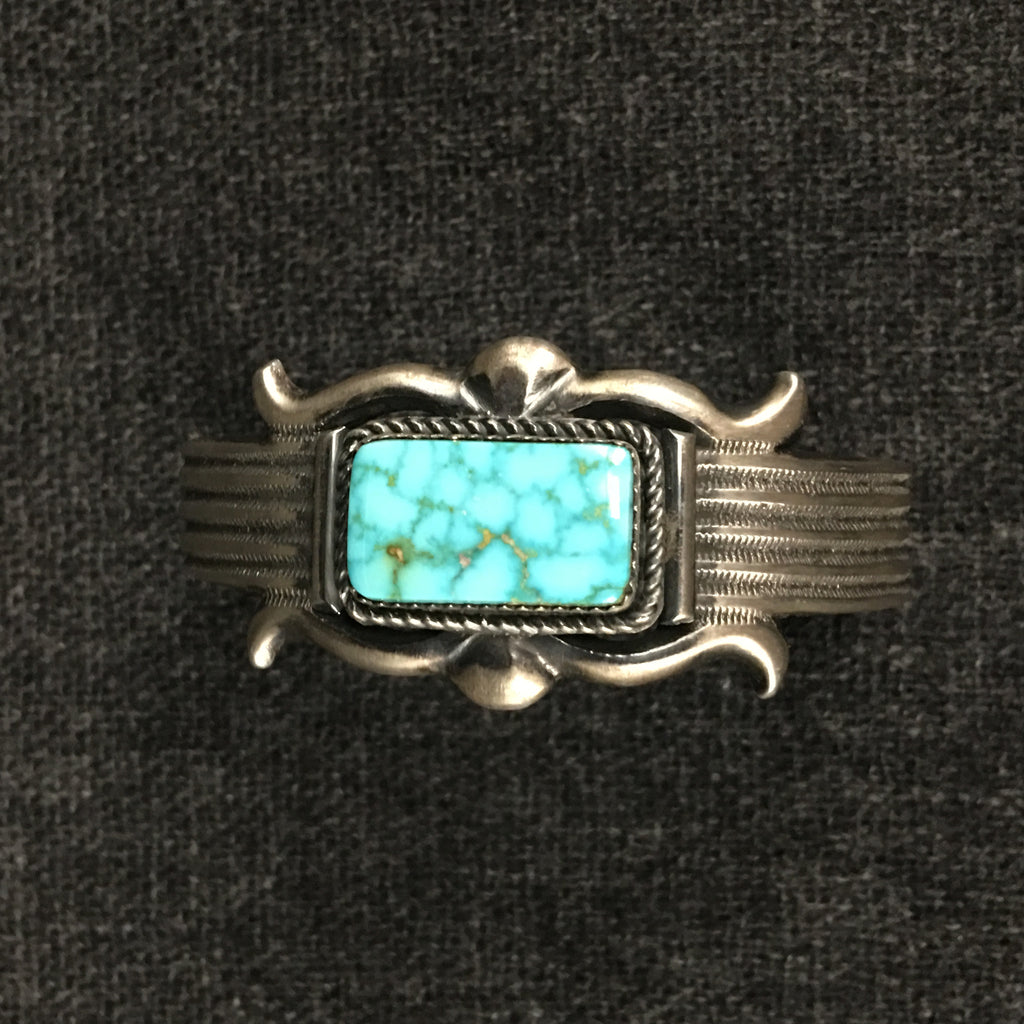 Native American Indian Navajo handmade sterling silver turquoise bracelet by E.S. Mitchell at Mahakala Fine Arts