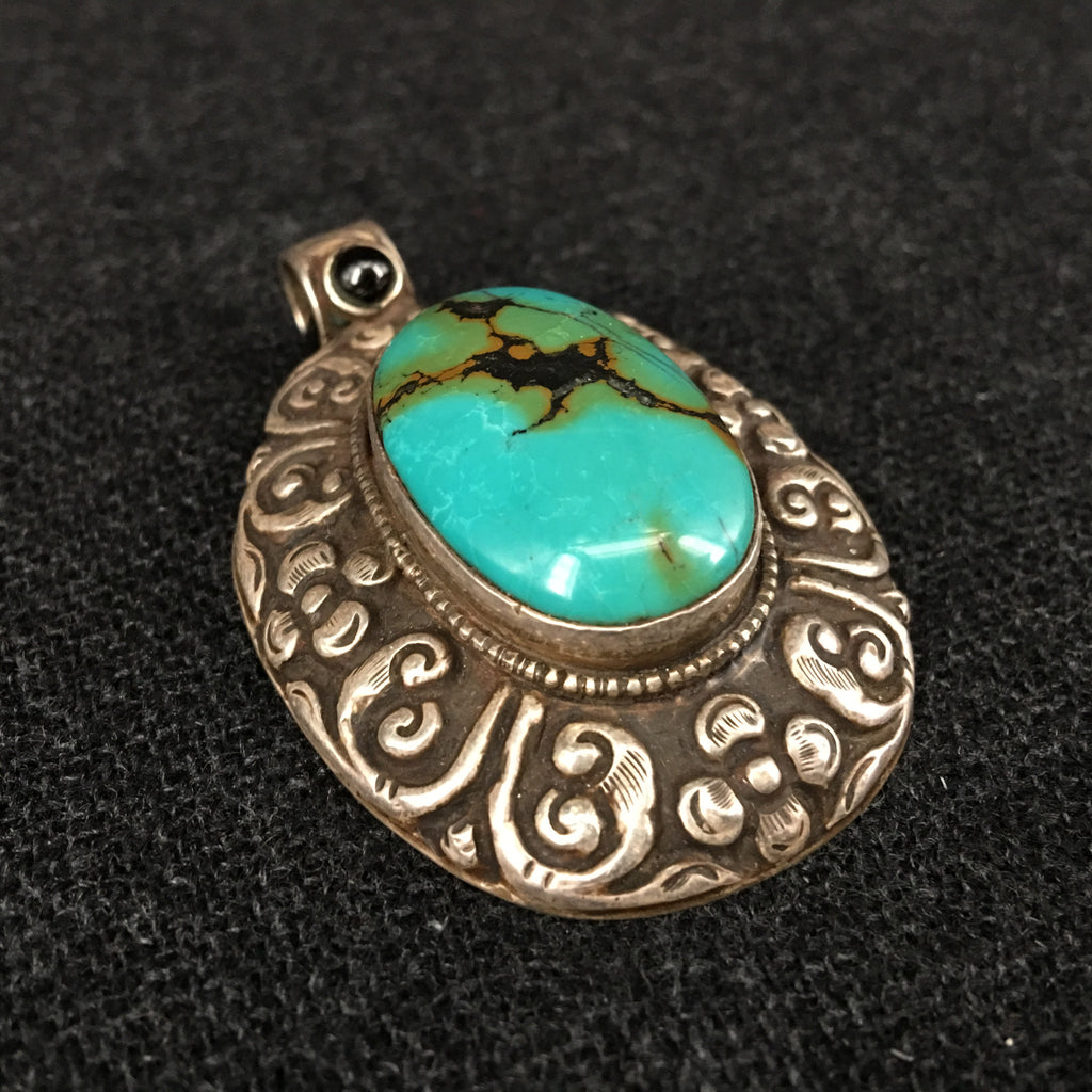 Handmade Tibetan Turquoise and Silver Pendant Jewelry at Mahakala Fine Arts